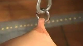 Рыжая рабыня стонет от пыток сосков и вагины иглами и кольцами