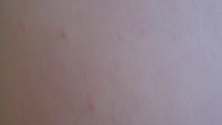 Рыжая с классной грудью делает минет своему ухажеру